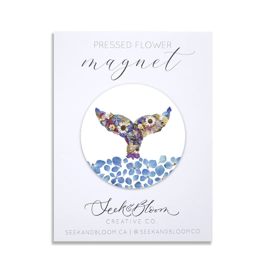 whale themed magnet made with blur and white and purplepressed flowers with water made with blue hydrangea blossoms